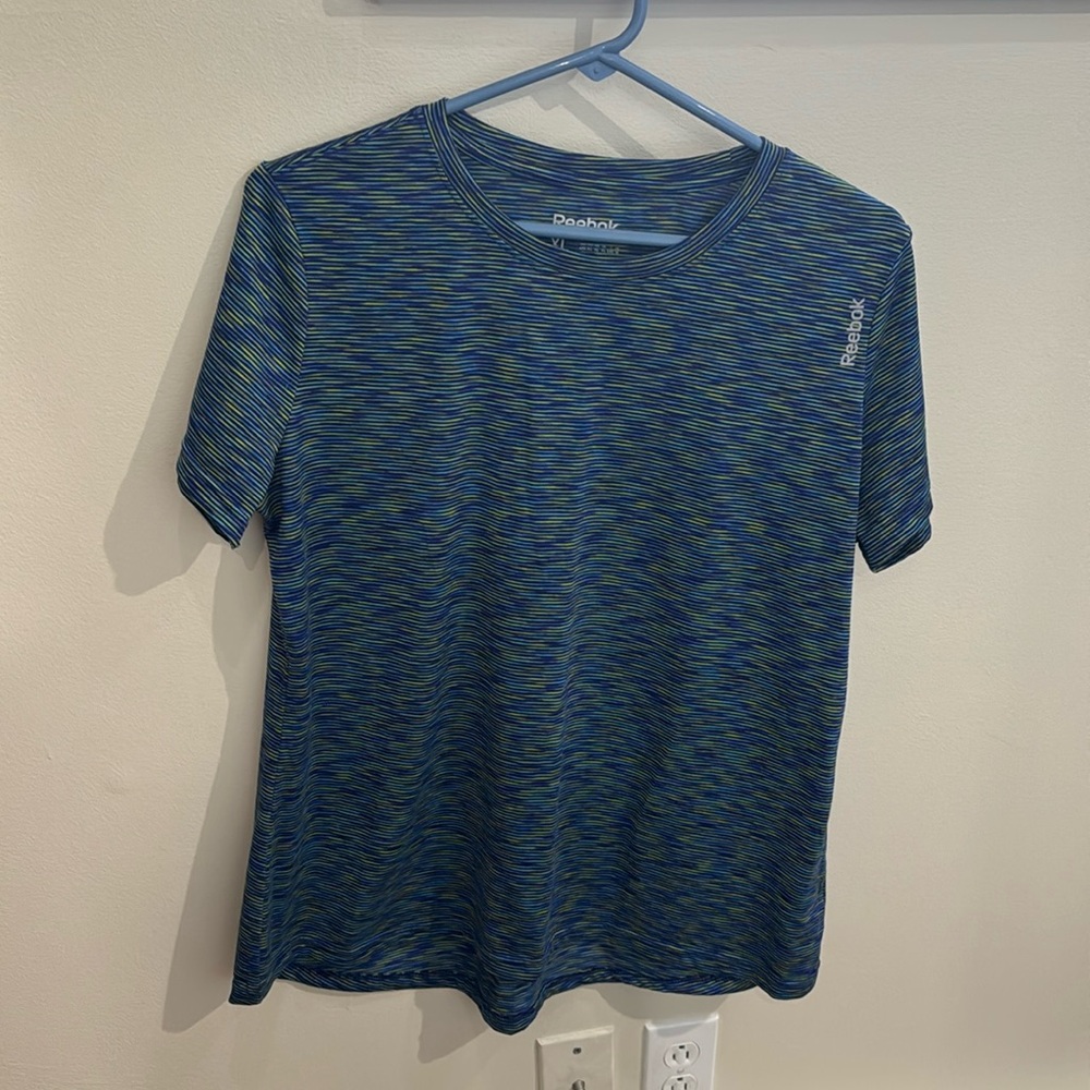 Women’s Reebok workout shirt. XL, polyester. A mix of blue and green, like new.